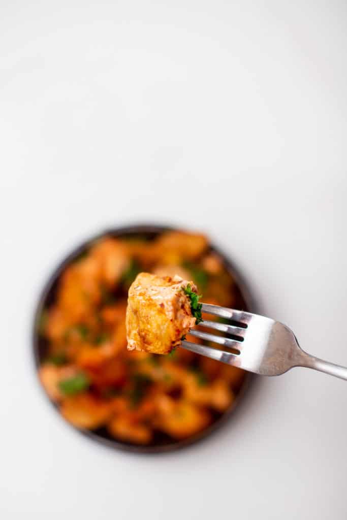 Potatoes are cut in 1-inch pieces for a patatas bravas recipe