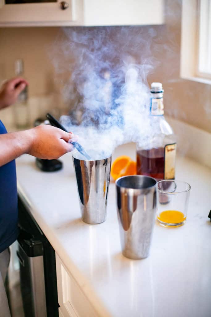 Smoking a bourbon cocktail using a smoking gun