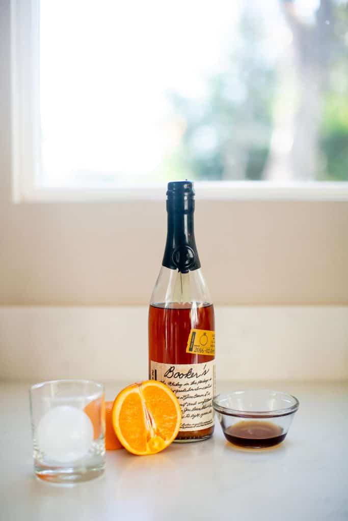 Ingredients for bourbon cocktail drink prepped on a table