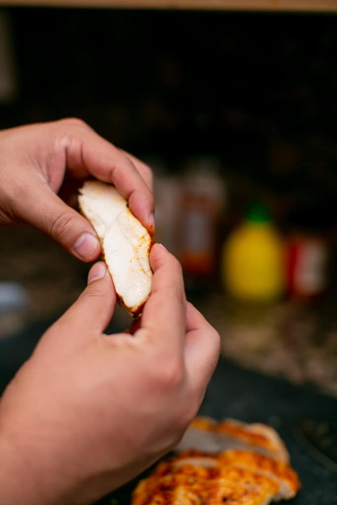 Close photo of a slice of oven baked chicken breast