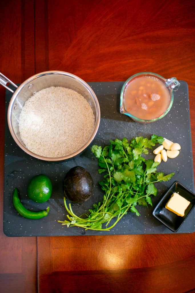 Prepping the ingredients for a pinto beans and chile lime rice recipe