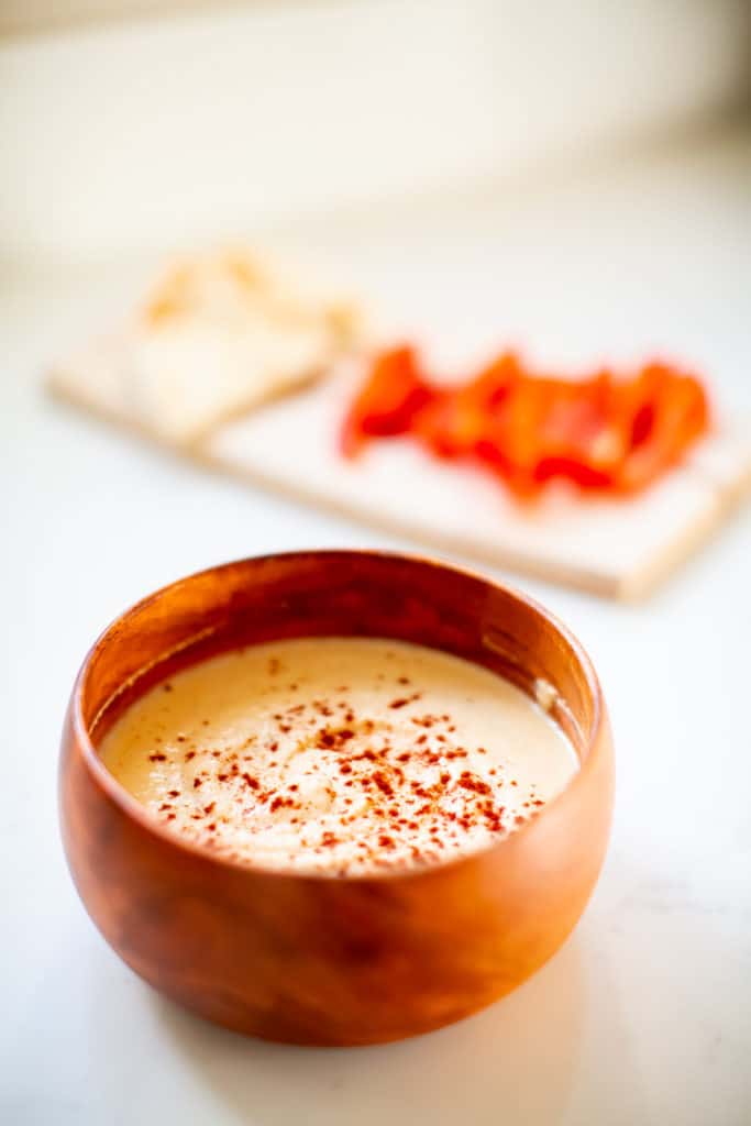 Roasted garlic hummus topped with paprika