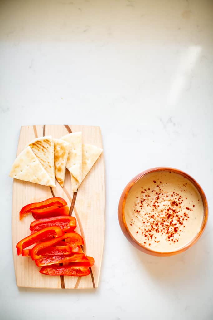 Roasted garlic hummus pairs well with pita bread