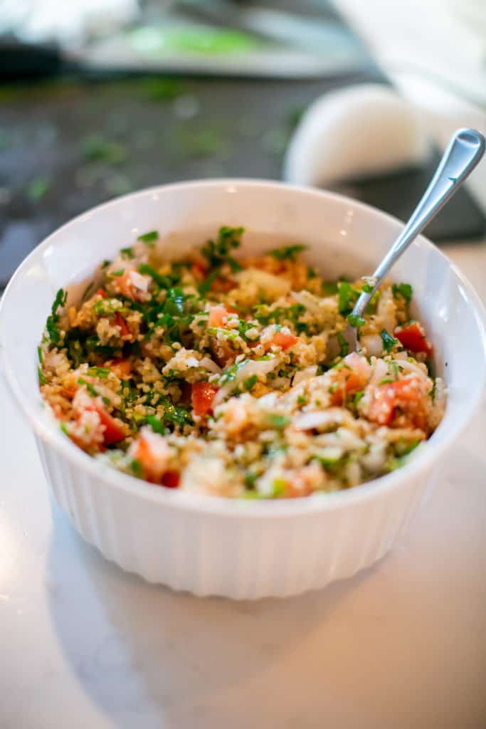 Close photo of tabouli served in a bowl