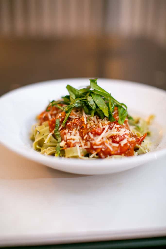 Close photo of pasta topped with homemade spicy tomato sauce