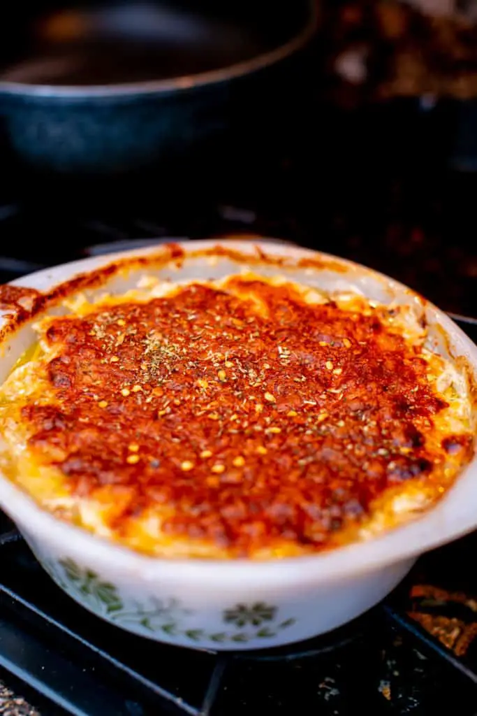 Perfectly baked au gratin in a white casserole