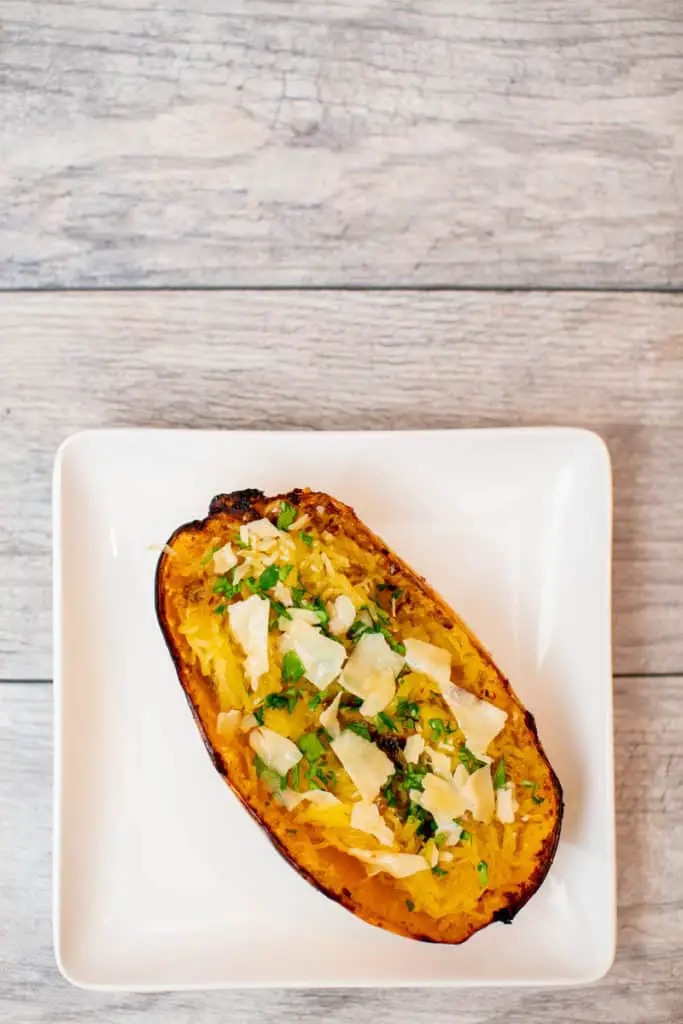 A top view of a plate of spaghetti squash