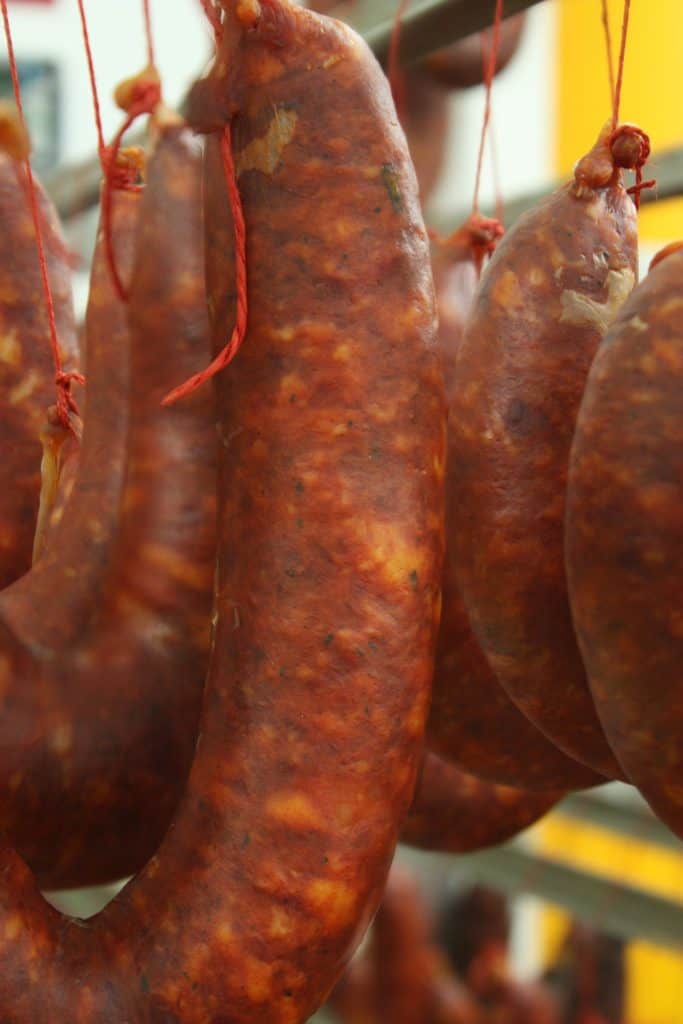 Chorizo hanging on a market stall