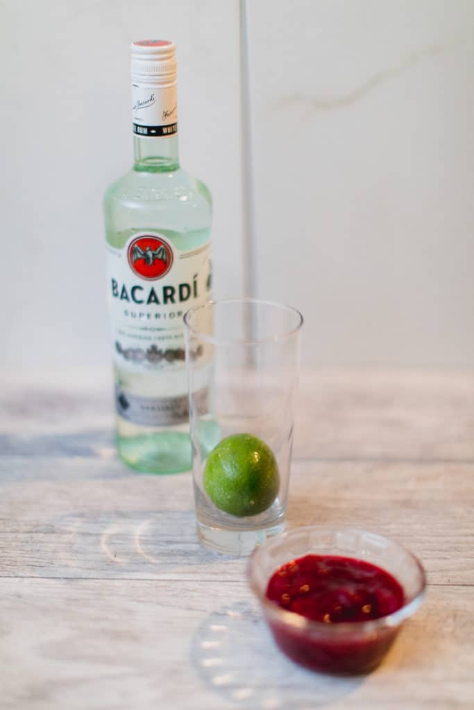 Ingredients needed for a cranberry daiquiri includes a Bacardi, lime, and cranberries