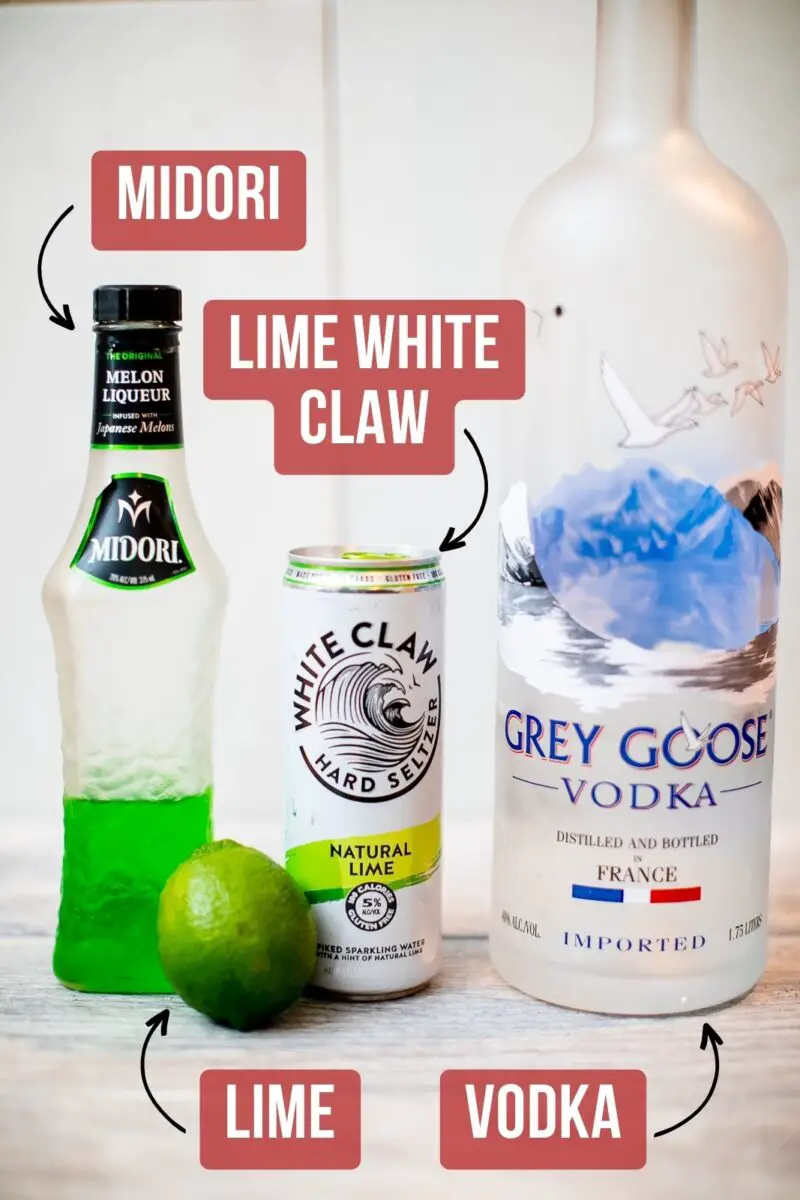 Lime White Claw cocktail ingredients on a wooden table in the kitchen