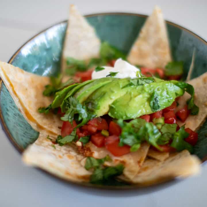 Avocado on top of a bowl of classic cheese quesadilla recipe
