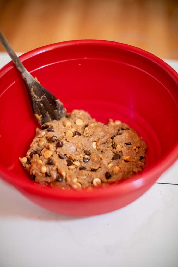 Cookie dough being mixed in a bowl