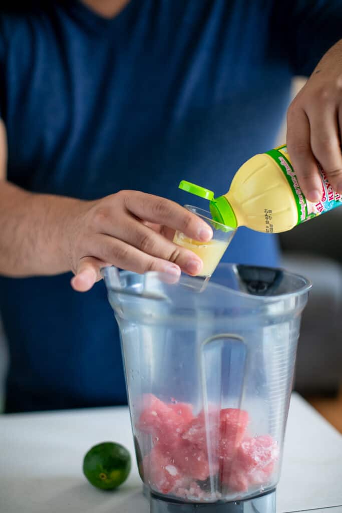 Mixing ingredients for the watermelon daiquiri