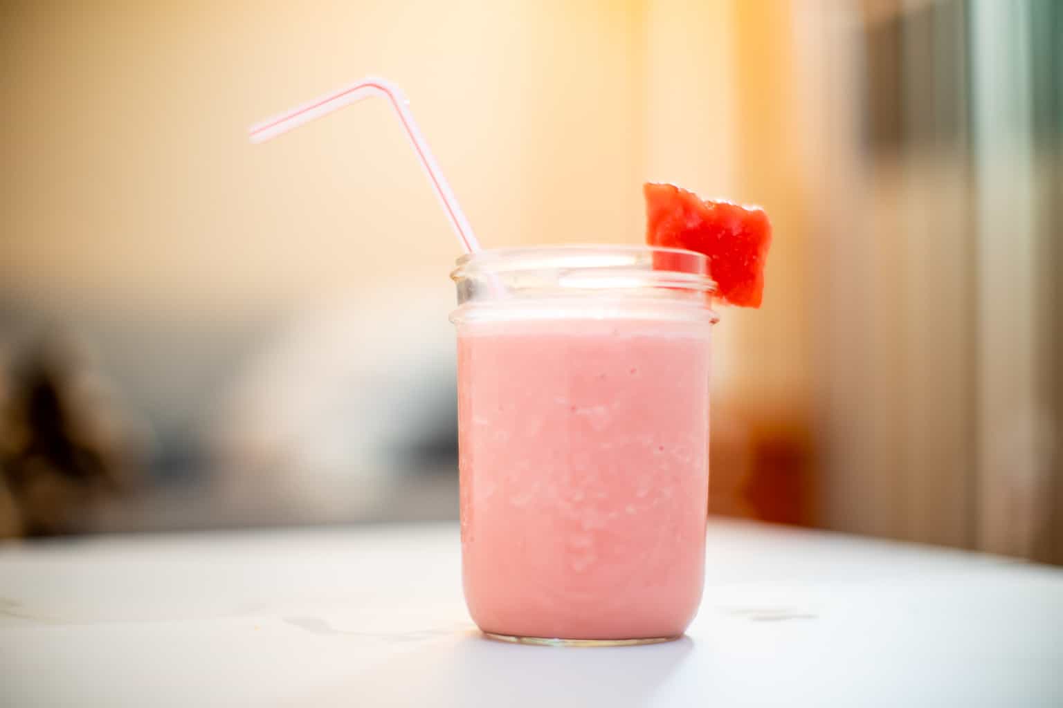 Watermelon smoothie recipe with yogurt in a mason jar