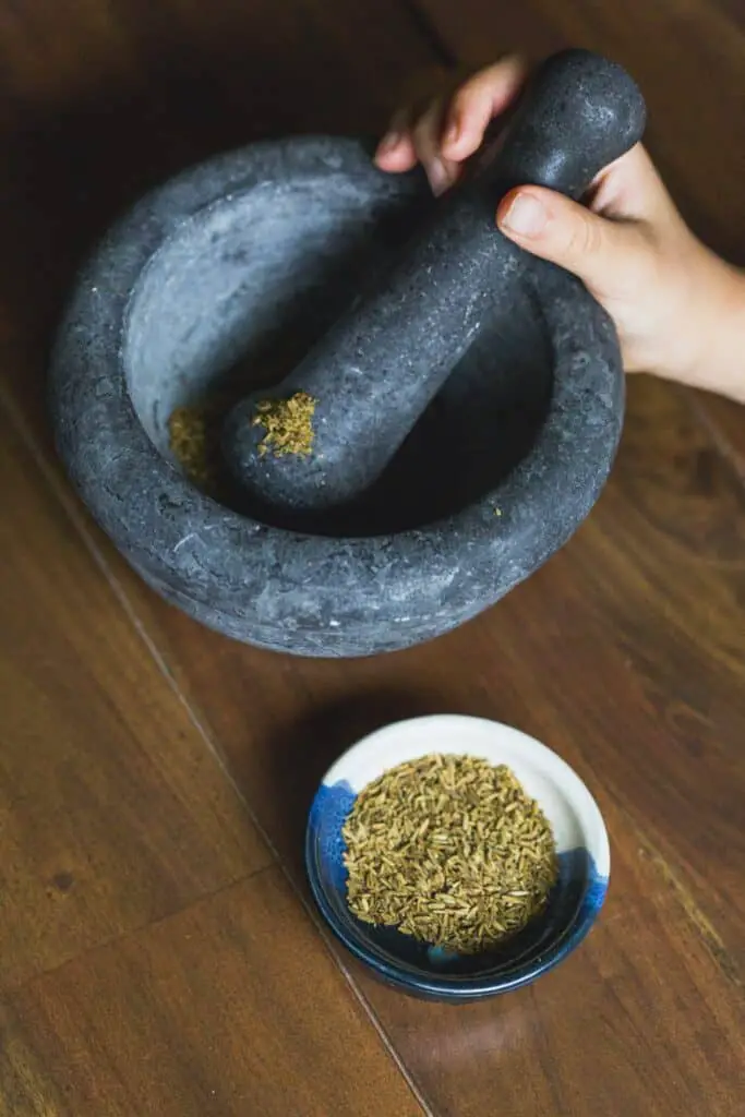Freshly grinded spices from a mortar and pestle