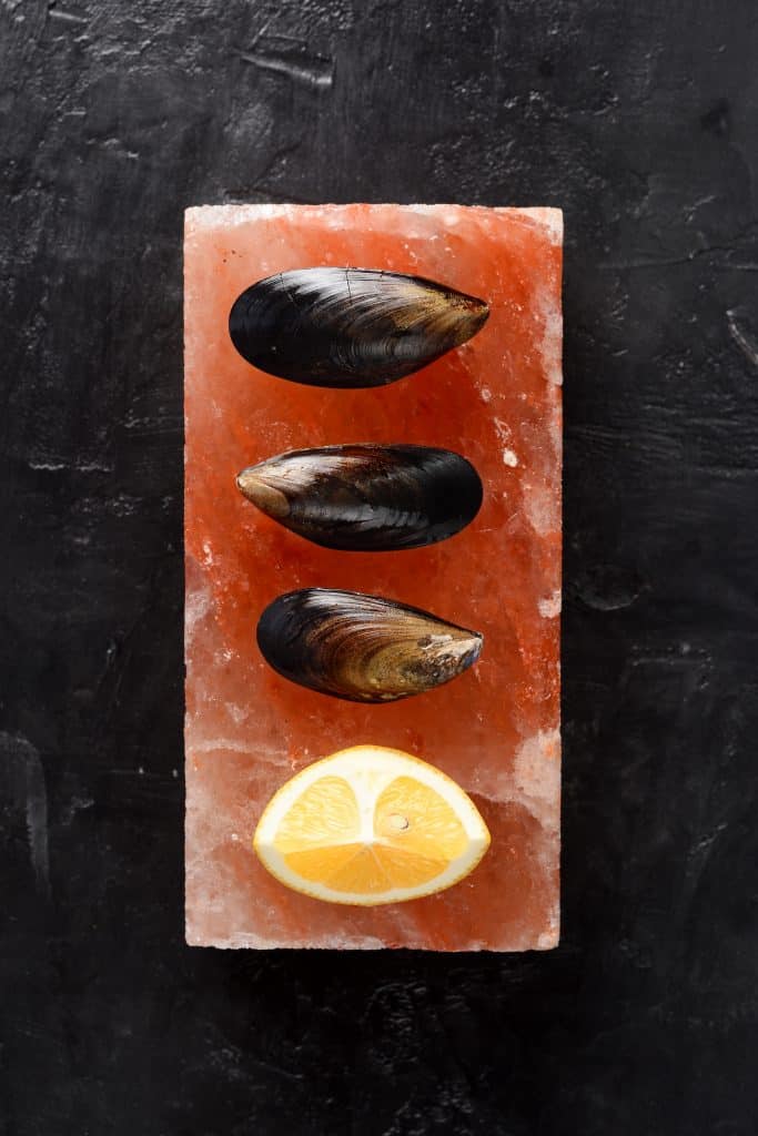 Seafood appetizer on a salt block