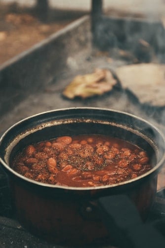 Baked beans being cooked in pan