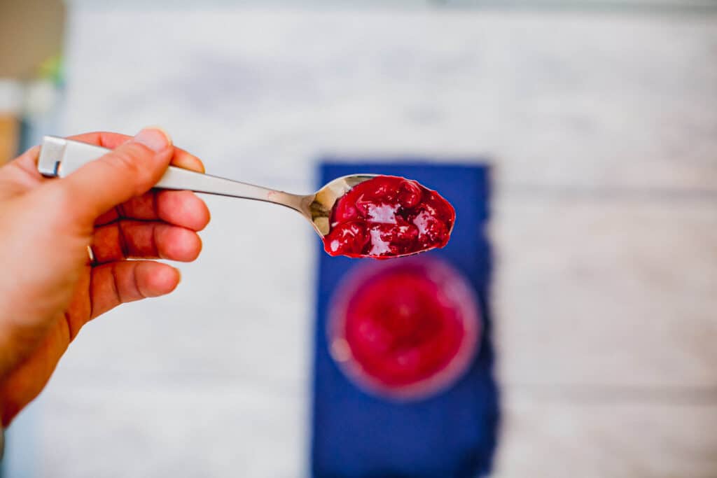 Cranberry sauce on a spoon