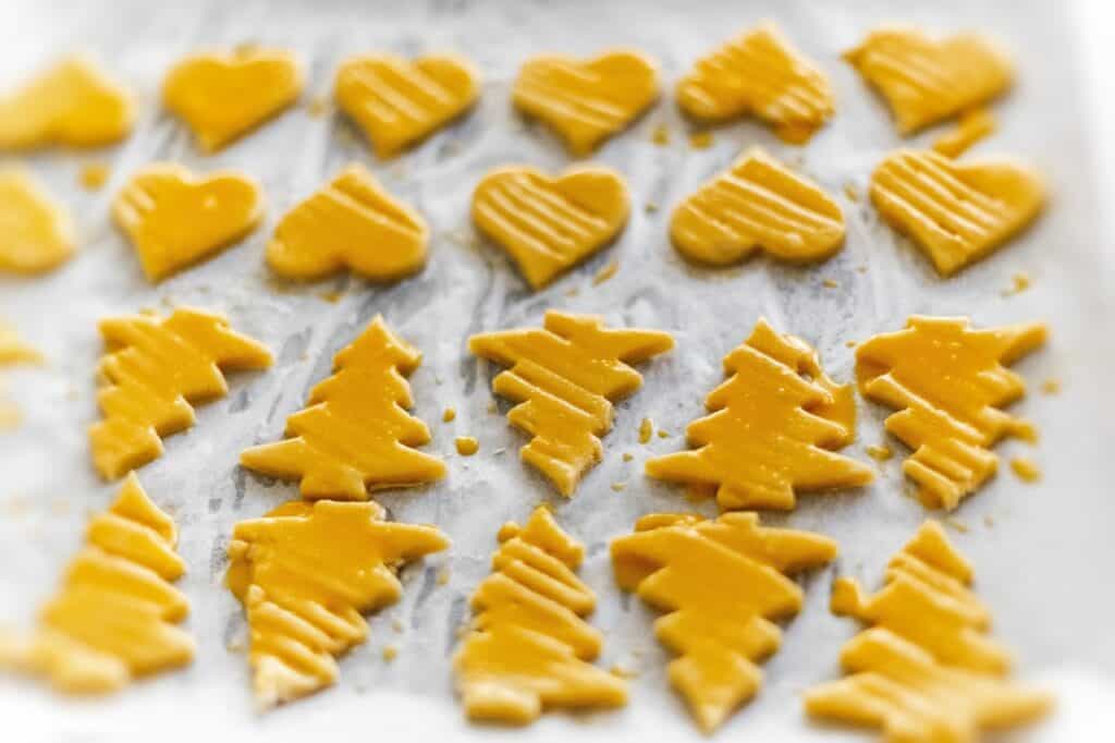 Christmas sugar cookies on a baking mat