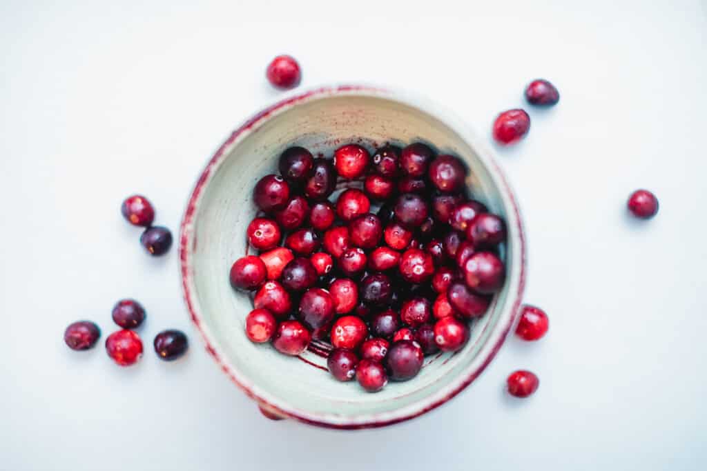 Ripe cranberries in a bowl