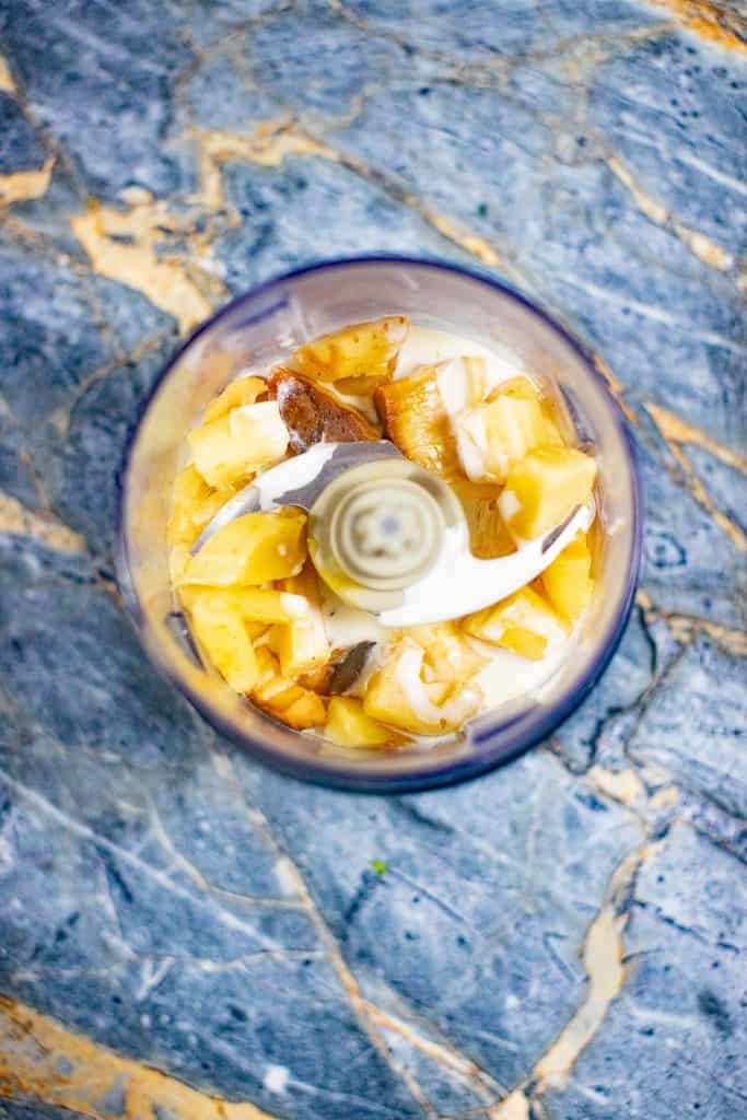 Parsnips and cream on a food processor