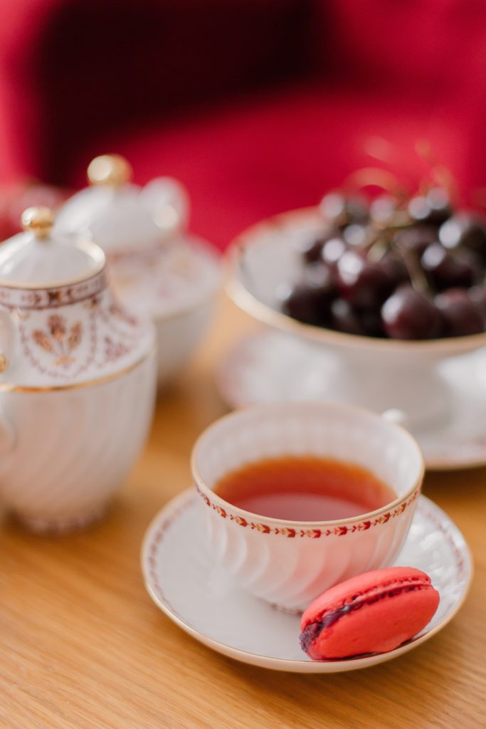 Macaron paired with a cup of tea