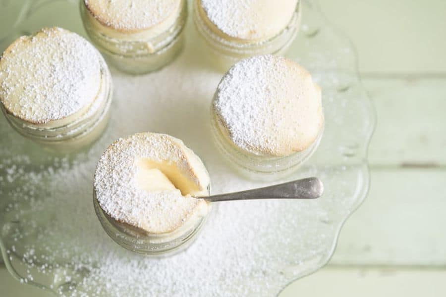 Soufflé in jars topped with powdered sugar