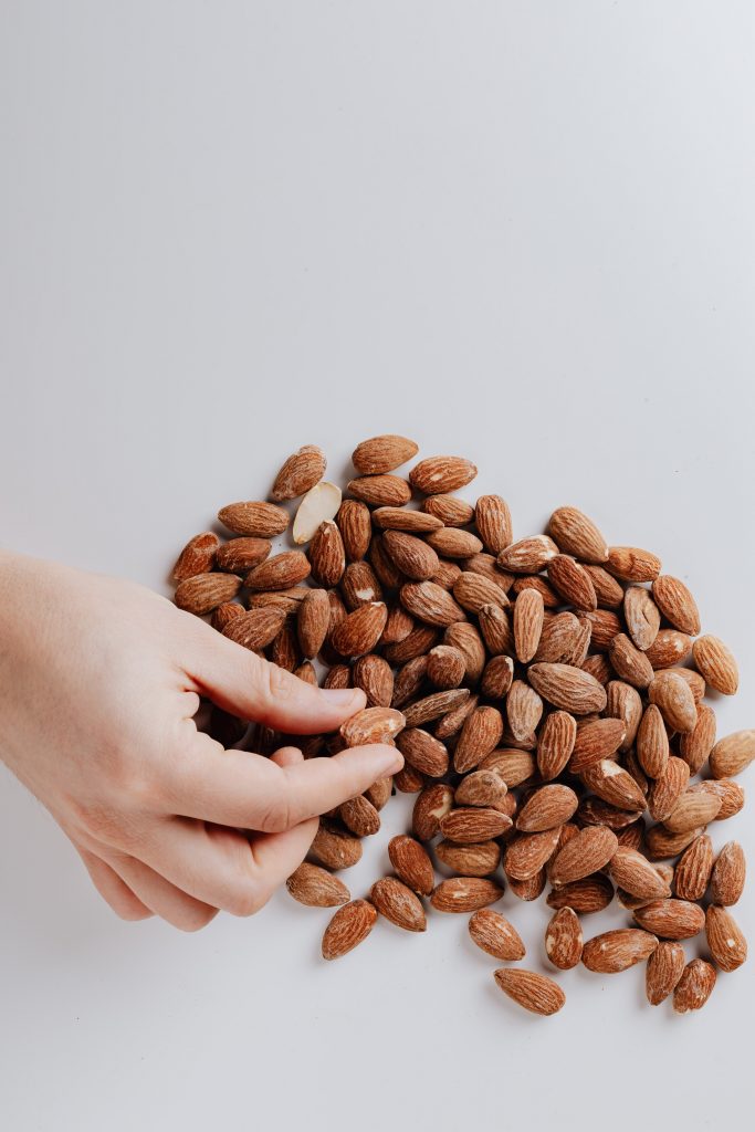 Almonds on a white table