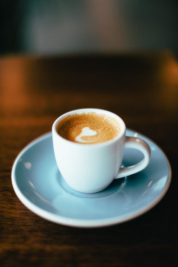 A cuban coffee in a teacup and tea plate