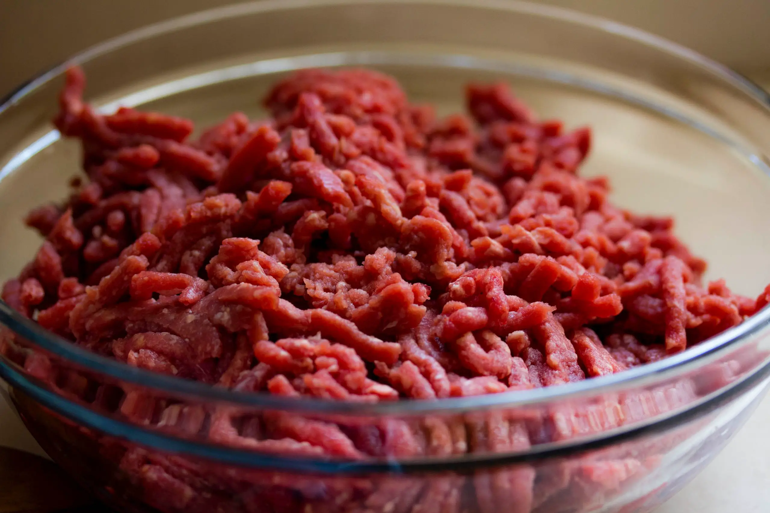 Ground beef in a small glass bowl