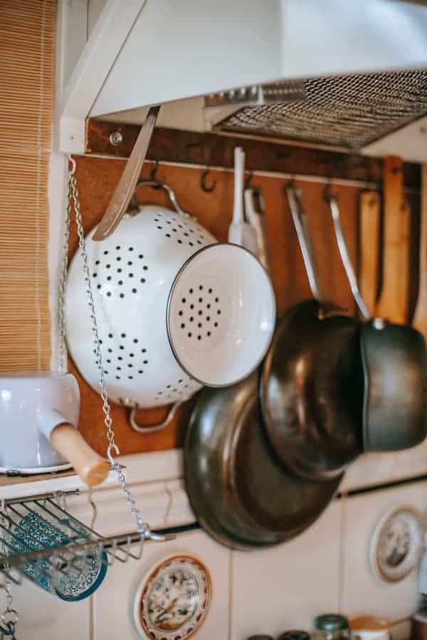 Cookware sets hanging in the kitchen
