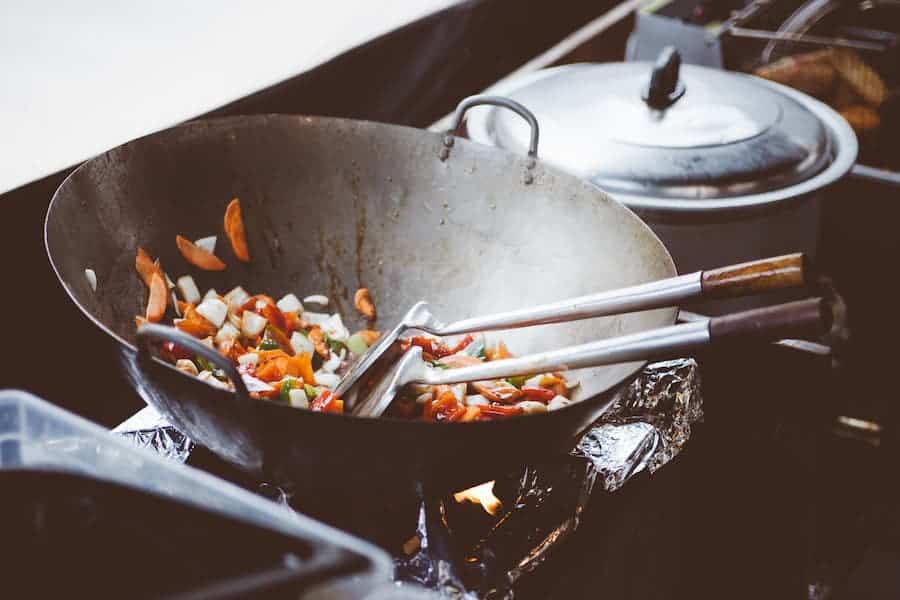 Cooking vegetables on a season stainless steel pan