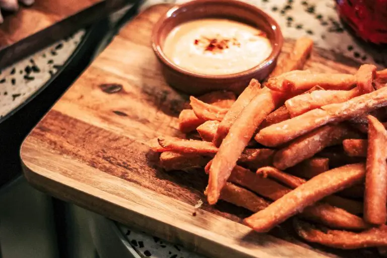 Sweet potato fries on a cutting board