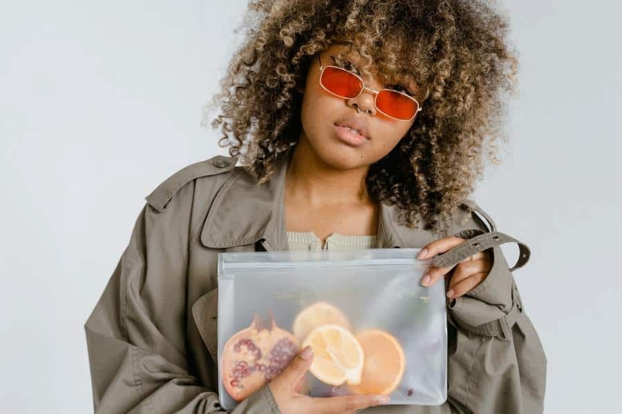 An image of a girl holding an example of the best silicone bag for sous vide cooking